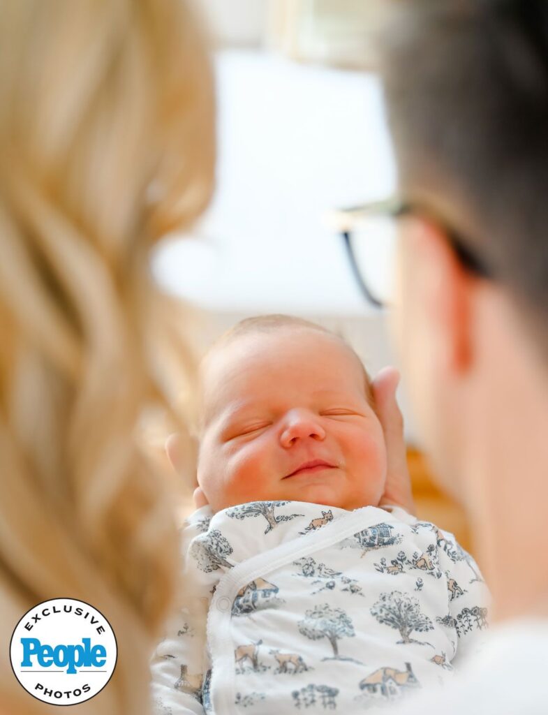 Rebecca Zamolo and Matt Slays with their newborn.